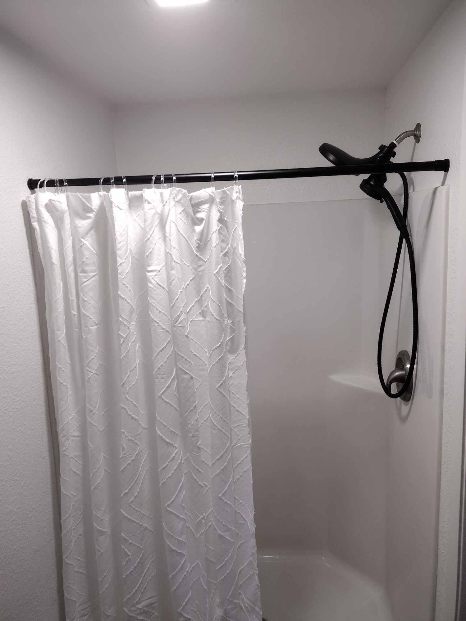 Shower and tub in a dome unit bathroom at The Domain, Aransas Pass